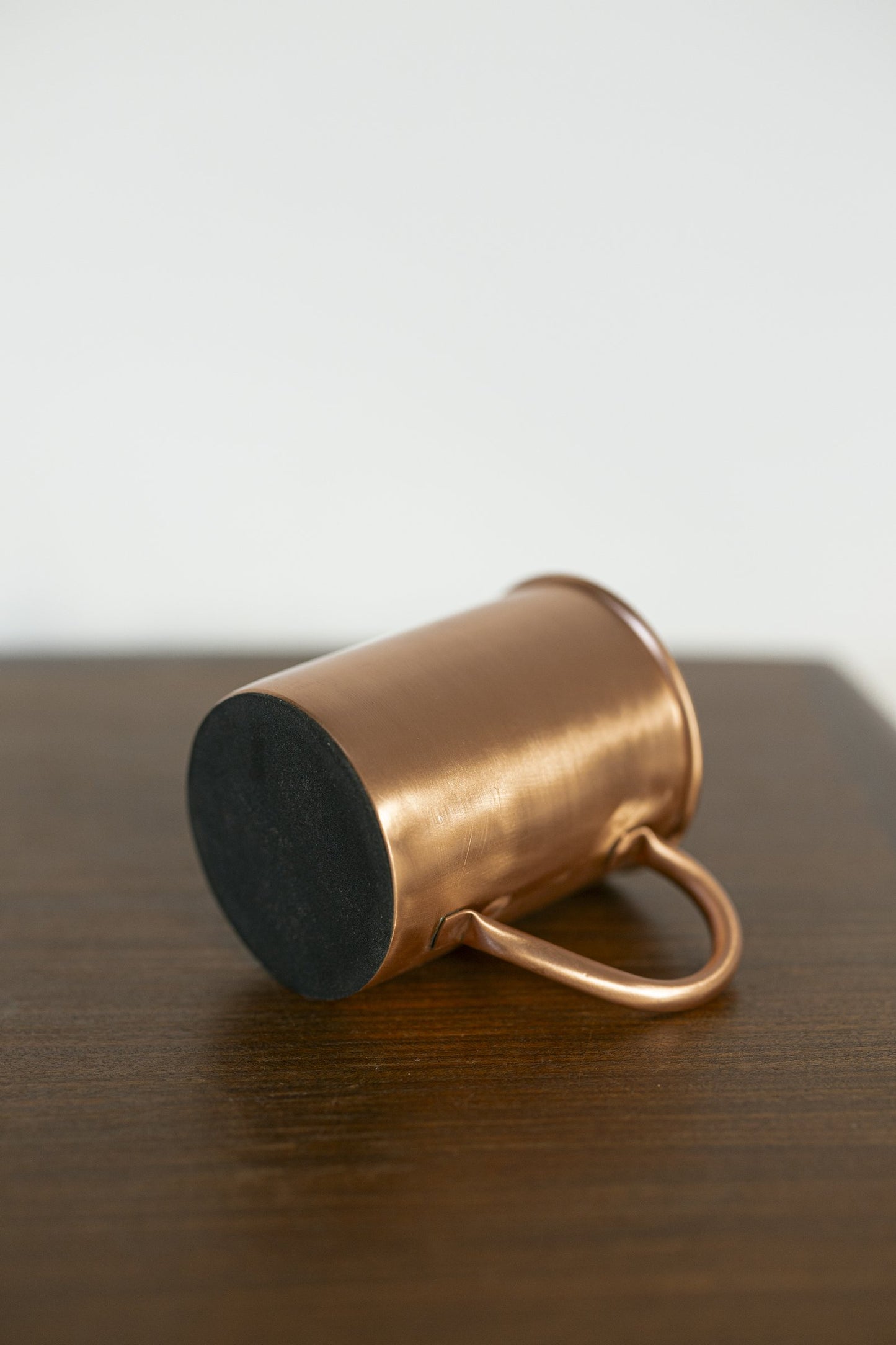 Kopero Caneca de Cobre Lisa deitada, com a base de feltro à vista