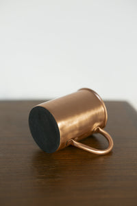 Kopero Caneca de Cobre Lisa deitada, com a base de feltro à vista